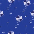 Seamless pattern with kites on blue background