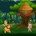 Zookeeper kids playing with lion under the treehouse