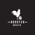 Creative standing rooster with movie cinema film rell Royalty Free Stock Photo