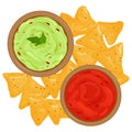 Bowls of avocado guacamole dip, tomato salsa sauce and nachos chips. Top view. Royalty Free Stock Photo