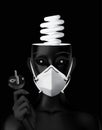 Realistic human head in medical mask with switched off bulb in the head and electrical plug in hand. Switch on your mind and think Royalty Free Stock Photo