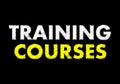 Training courses writing on black chalkboard. Business Concept. Royalty Free Stock Photo