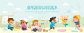Kids play together in kinder garden. Playroom with children. Royalty Free Stock Photo