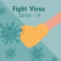 Hand wearing a blue boxing glove fighting with COVID-19 virus.