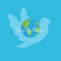 A dove and a globe vector in commemoration of peace day