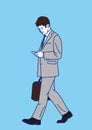 Side portrait businessman walking  using smart phone Royalty Free Stock Photo