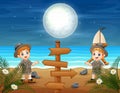 Two safari kids in the beach at night Royalty Free Stock Photo