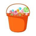Halloween sweets and candies on the bucket Royalty Free Stock Photo