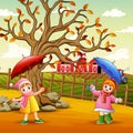 Happy girl holding umbrella at the farm landscape Royalty Free Stock Photo