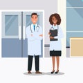 Male and female doctors isolated on background