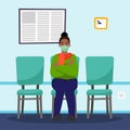 Woman patient in the hospital sitting at waiting room