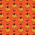Halloween seamless pattern. Pumkins and bats on an orange background. Scary endless pattern for fabric, paper.