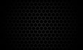 Black background. Dark hexagon carbon fiber texture. Royalty Free Stock Photo