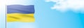 Ukraine flag waving on a blue sky background. Royalty Free Stock Photo