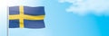 Flag of Sweden waving on a blue sky background. Royalty Free Stock Photo