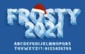 Frosty 2021 alphabet font. 3D ice letters and numbers with Xmas hat. Royalty Free Stock Photo