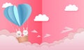 Cute bunny couple in lovely hot air balloon. Origami style concept vector background.