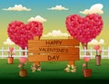 Happy Valentines Day sign with heart trees in the park