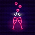 Glowing glasses with champagne valentine`s day celebration romantic evening romantic dinner neon style