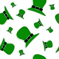 Green traditional hats scattered on white randomly.