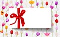 Blank white gift card with red ribbon on floral background tulip flowers in vertical lines