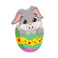 Cartoon Easter bunny inside a cracked Easter egg Royalty Free Stock Photo