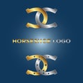 Gold and silver horseshoe logo