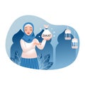 Muslim woman give alms or zakat in the month of Ramadan. Charity concept.