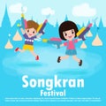 Songkran festival kids holding water gun enjoy splashing water in Songkran festival, Thailand Traditional New Year`s Day isolated Royalty Free Stock Photo
