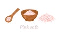 Pink Himalayan salt in wooden bowl, spoon and heap of salt isolated