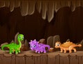 Cartoon three of dinosaurs in the dark cave