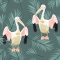 Tropical vintage palm leaves, pelican floral seamless pattern on dark green background. Royalty Free Stock Photo