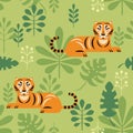 Seamless pattern with tigers and tropical leaves Royalty Free Stock Photo