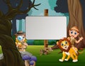 The zookeepers boy and lion in the jungle