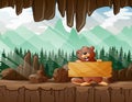 A beaver holding wooden sign in the cave entrance Royalty Free Stock Photo