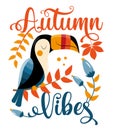 Autum vibes- toucan bird on branch with autumn leaves