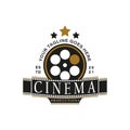 Vintage Retro Logo Style for Cinema Movie Studio Production Logo. With gold and white film reel stripes, and filmstrip roll tapes Royalty Free Stock Photo