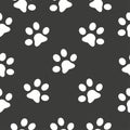 Cat paw seamless pattern, outline print on black background