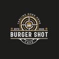 Vintage Retro Style for Burger Restaurant Logo Design. With shot target on gold, black, and white colors Royalty Free Stock Photo