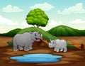 Cartoon a mother rhino with her cub at nature Royalty Free Stock Photo