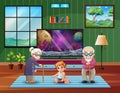 Grandparents with their grandchildren in the living room Royalty Free Stock Photo