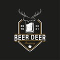 Vintage Retro Style for Beer Deer House or Brewery Logo. With beer glass icon and deer horns. Premium and Luxury Logo Royalty Free Stock Photo