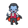 Cute little boy dracula cartoon stands and giving thumb up