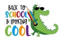 Back to school and looking cool- funny slogan with cartoon alligator and pencil. Royalty Free Stock Photo