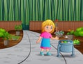 A girl throw garbage in the garden trash Royalty Free Stock Photo
