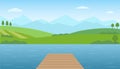 Empty wooden pier at lake. Panoramic summer landscape. Rural scenery with lake, green hills and mountains.