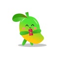 Mango cartoon with happy expression looking at cell phone Royalty Free Stock Photo