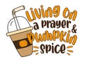 Living on a prayer and pumpkin spice - autumnal saying with pumpkin spice latte. Royalty Free Stock Photo