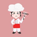 Cute chef girl holding closed sign