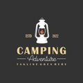 Camping logo with lantern Vintage emblem forest Royalty Free Stock Photo